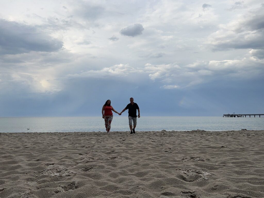 couple, beach, holding hands-7344565.jpg